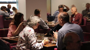 Alumni enjoying lunch and time to chat with friends at the Annual Alumni Reunion