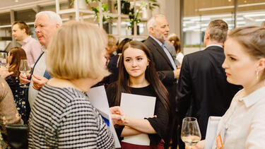 Students networking with alumni during the City Connections reception