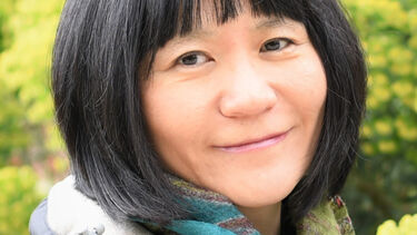 A profile photograph of Dr Jingrong Tong. 