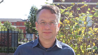 Bob Stern standing outside HRI building