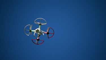 Drone flying through the sky