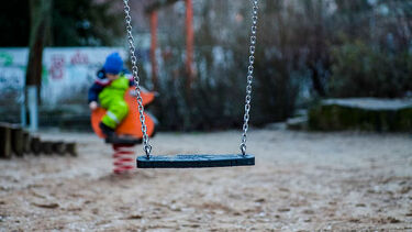 A swing in a park