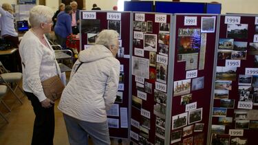 Visitors looking at the exhibits