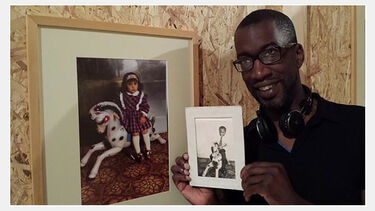 Andy shows a photo of himself as a child