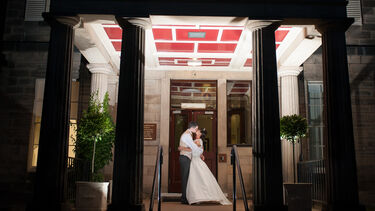 Wedding couple outside Halifax Hall hotel