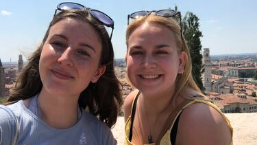 German students on Year Abroad with Austrian cityscape in background
