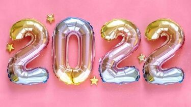 A photo of four balloons, shaped like the numbers 2, 0, 2 and 2