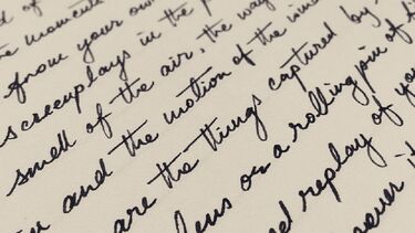 A photo of very neat and fancy handwriting