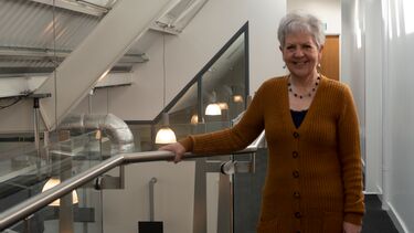 A photograph of Penny Dick on the Management School's mezzanine.