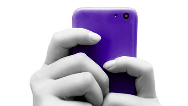 hands holding phone