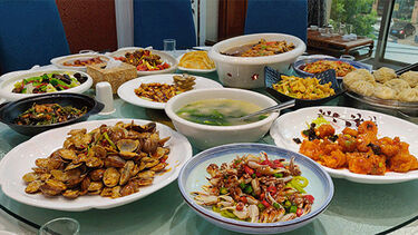 Table filled with Chinese food