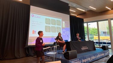 TAP team presenting at a conference.