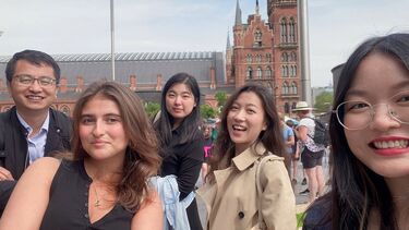SCI staff with contestants Isabella and Chao Chao Yi