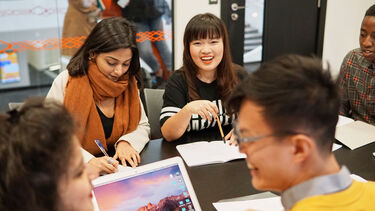 Photograph of students working together