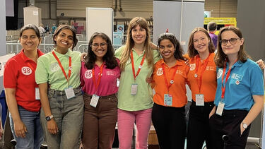 A group of women in coloured shirts