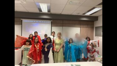 Teacher Nancy with her students in period dress