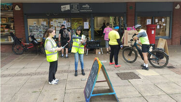 The urban room, Live Works, showing students interacting with the public in the forecourt outside the Urban Room