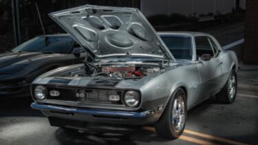 A car with its bonnet open.