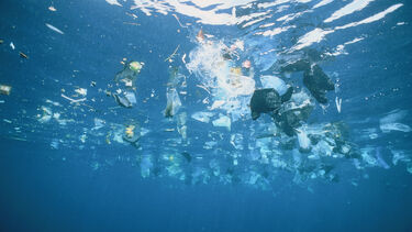 Plastic waste underneath the surface of the ocean