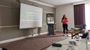 Erica Ballantyne delivering a presentation.