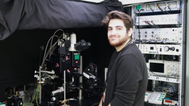 Andrea Aveta in front of equipment