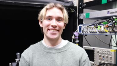 charles cranston in front of equipment