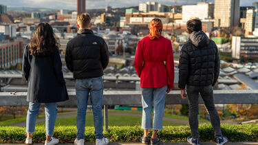 Students looking out across the city