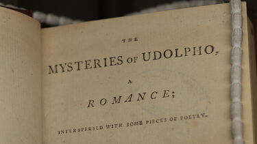 A close up of the title page of Mysteries of Udolpho by Ann Radcliffe