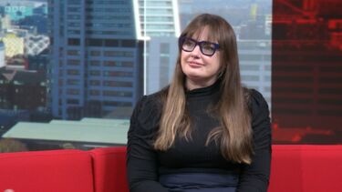 Susan Oman sat on a red sofa in the BBC Look North studio. 