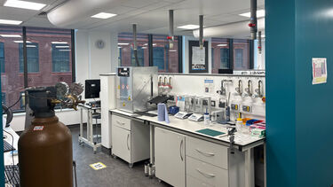 Landscape photo of part of the basic characterisation lab, a desk with equipment on