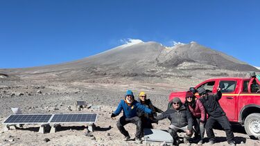 The VolcanoTech team and collaborators in front of a volcano in Chile