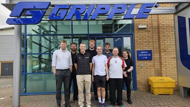 Researchers outside Gripple building