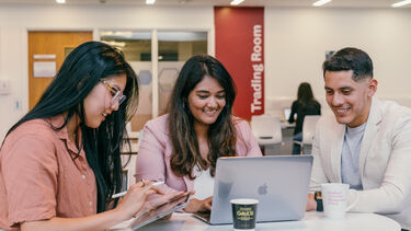 a group of MBA students working together