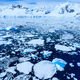 Melting polar ice caps, indicating the theme of climate change.