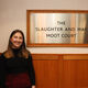 Photograph of School of Law Alumni Jess Edwards standing outside the Moot Court