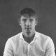 Black and white headshot of man