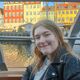 Student Megan Swanson smiling next to a river.