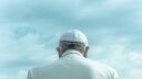 The back of the Pope's head an shoulders