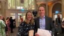 Dr Thomas Darton and Dr Ruth Payne holding award certificates