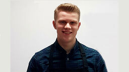 A profile photo of Alex Buxton.