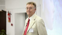 Professor Roger Moore at a conference 