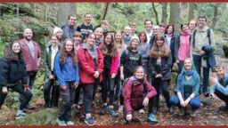 large group of students in outdoor gear in the Peak District
