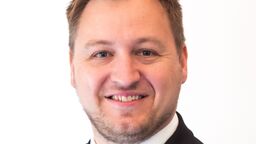 Jonny Wathen wearing a suit.