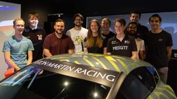 Members of the SFR team at Aston Martin