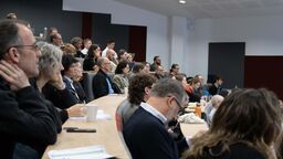 Lecture theatre full of engaged attendees