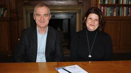 Professor Conchúr Ó Brádaigh and Jo Harrison signing an MoU